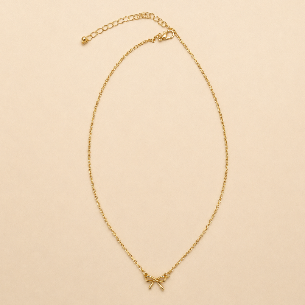 MINI GOLD BOW CHARM NECKLACE | 80N346