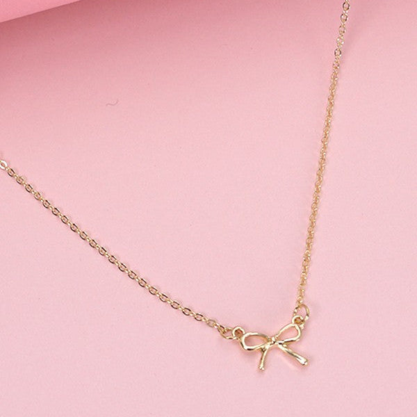 MINI GOLD BOW CHARM NECKLACE | 80N346