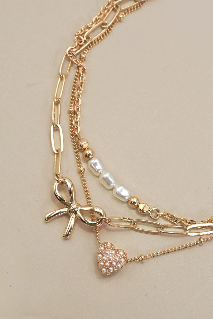 CHARM BRACELET-MULTI LAYER BOW PERAL HEART CHARMS | 80B1317