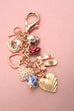 PORCELAIN BOWS HEARTS PEARL STRAWBERRY BAG CHARM | 80K008
