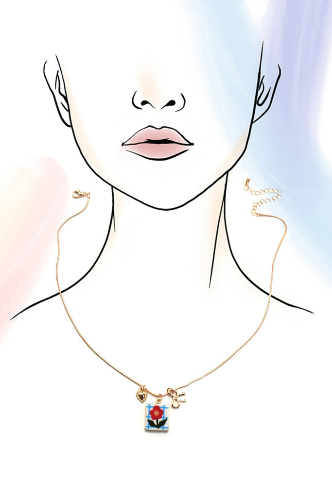 PORCELAIN CLUSTER CHARM BOW HEART NECKLACE | 80N91840