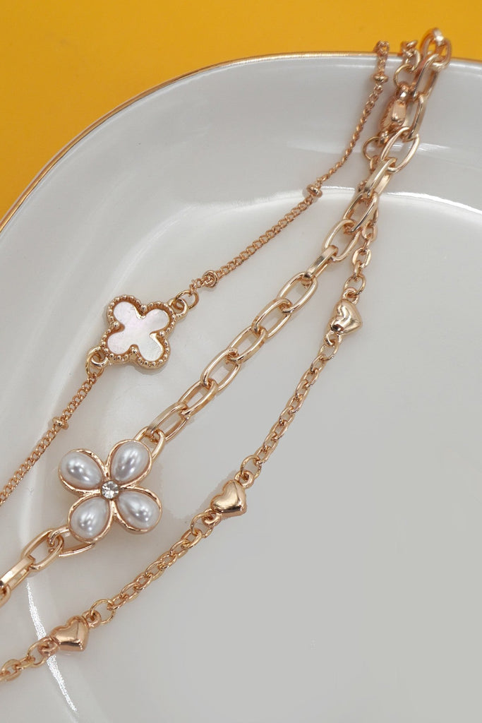 CHARM BRACELET-MULTILAYER FLORAL PEARL CROSS | 80B1352