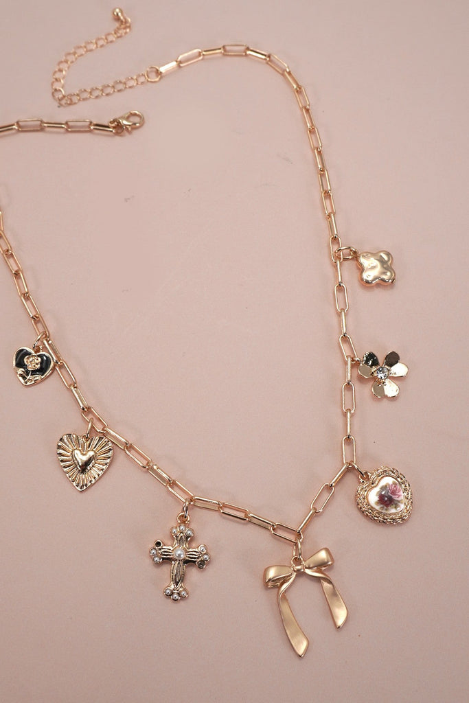 CHARM NECKLACE-PORCELAIN FLORAL BOW CROSS HEART | 80N92151