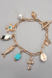 CHARM TOGGLE BRACELET-FISH CROSS CONCH PEARL | 80B1514