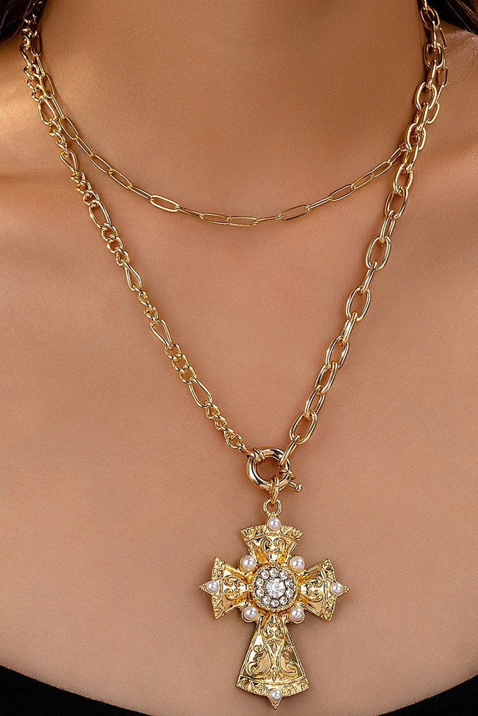 MULTI LAYERED CROSS STATEMENT NECKLACE | 80N92465