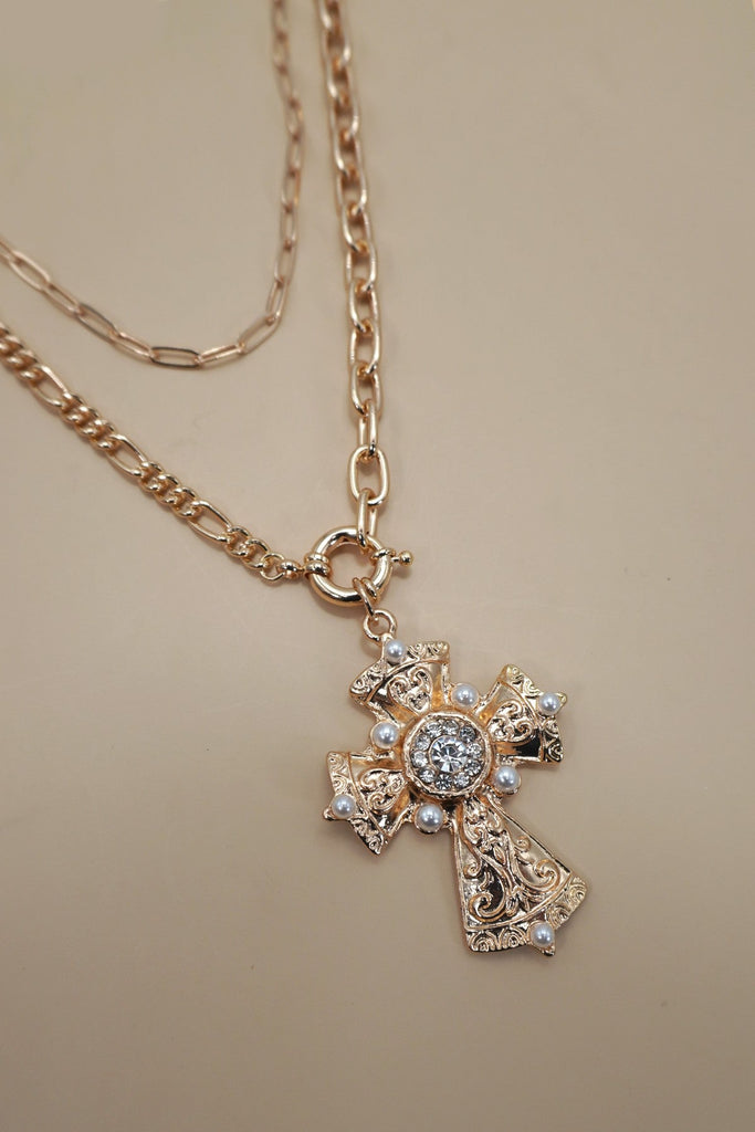 MULTI LAYERED CROSS STATEMENT NECKLACE | 80N92465