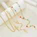 BOHO Y MULTI STONE CROSS LARIAT LAYER NECKLACE | 80N92467