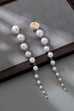 LONG STATEMENT LINEAR PEARL DROP EARRINGS | 80E61438