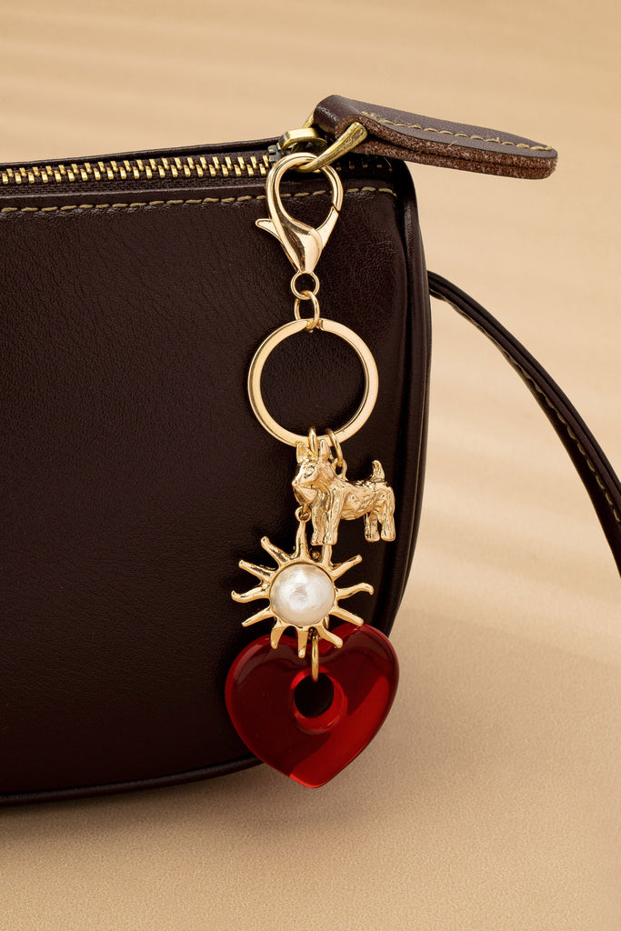 BAG CHARM KEY CHAIN-RESIN HEART DOG PEARL SUNBLAST | 80K092