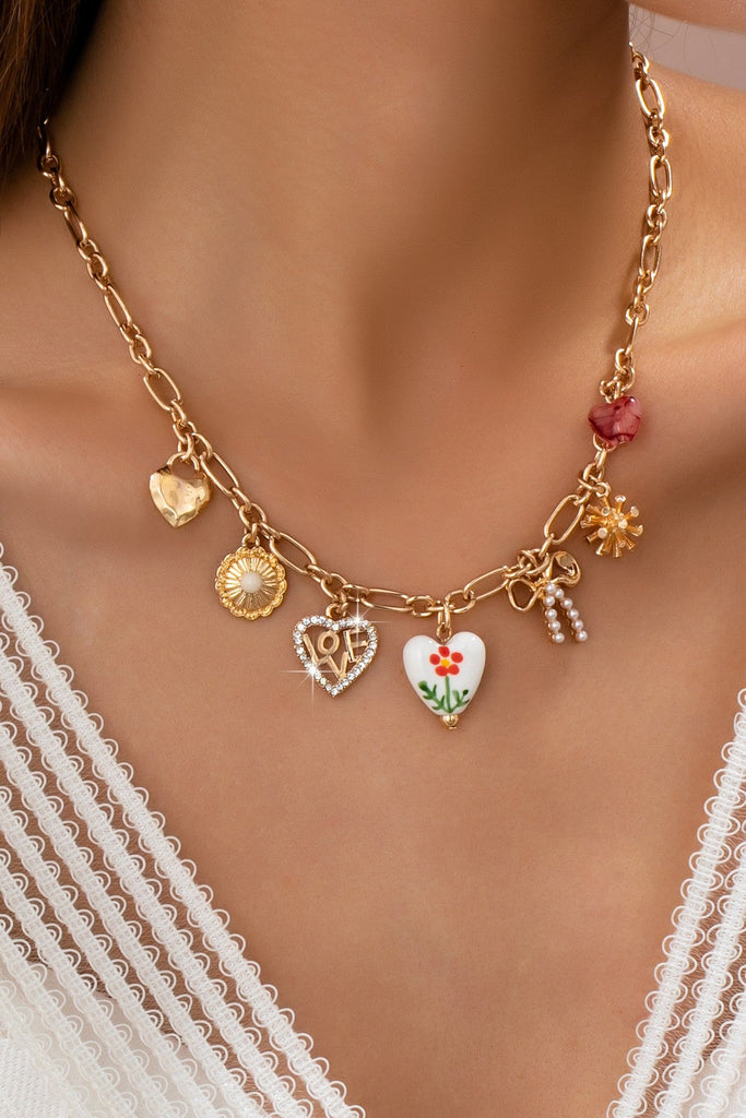 Gold Figaro Chain Multi-Charm Statement Necklace | 80N92748
