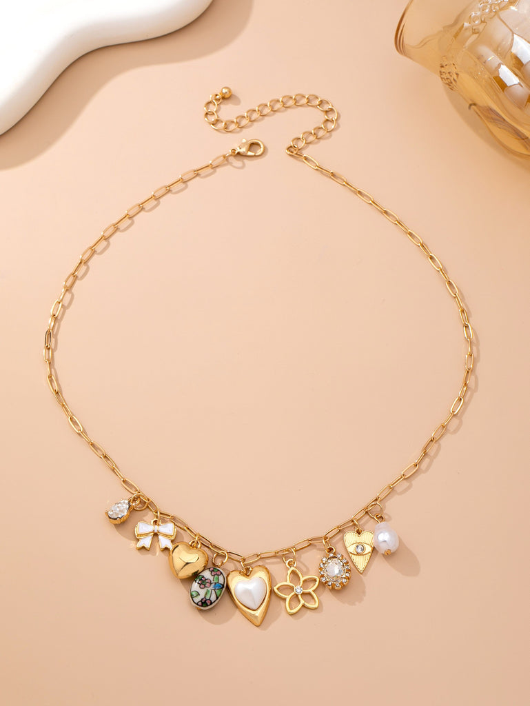 Charm Necklace-Charming Heart Bow & Pearl Dangle | 80N92810