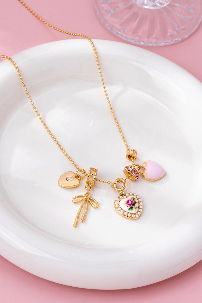 Multi Charm Porcelain Bow Ball Chain Necklace | 80N92892