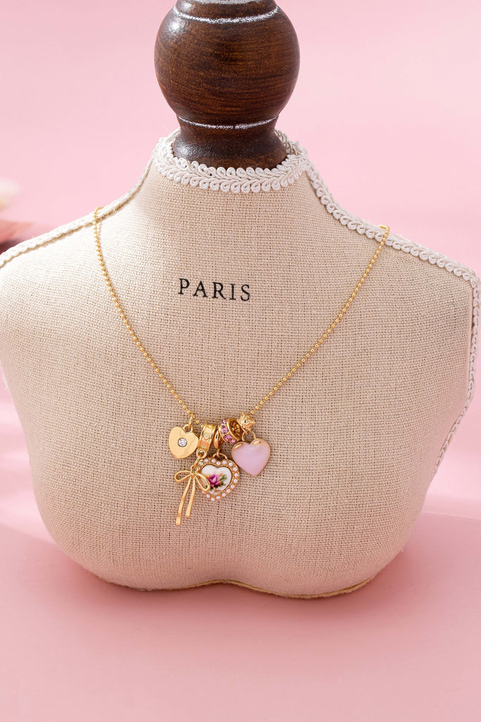 Multi Charm Porcelain Bow Ball Chain Necklace | 80N92892