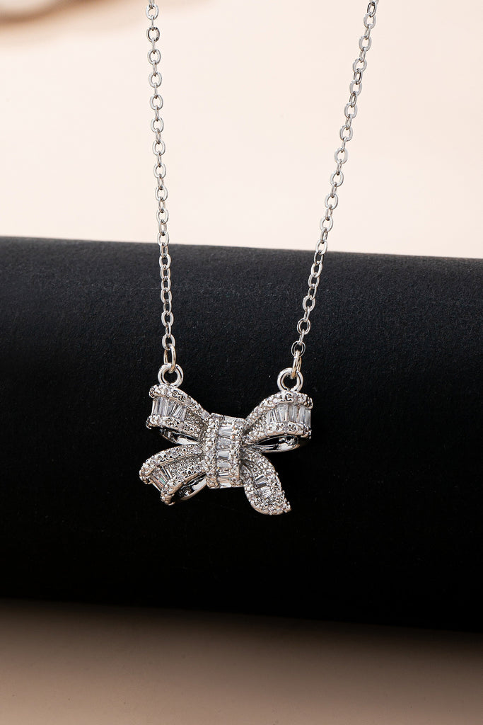 Sparkling Crystal Bow Pendant Necklace | 80N92845