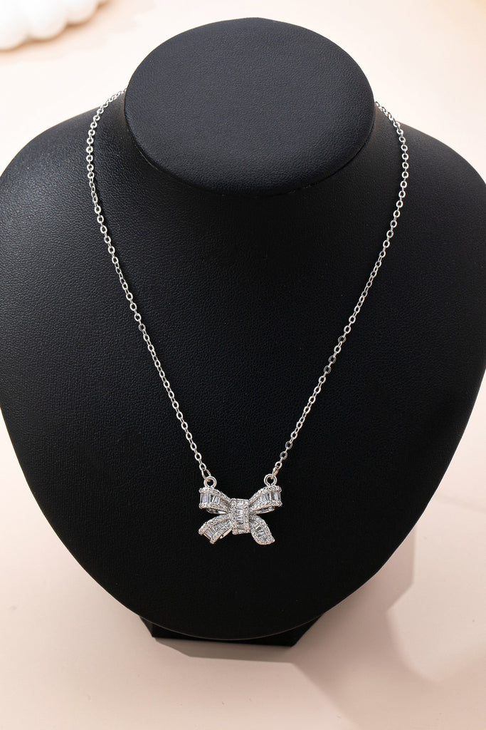 Sparkling Crystal Bow Pendant Necklace | 80N92845