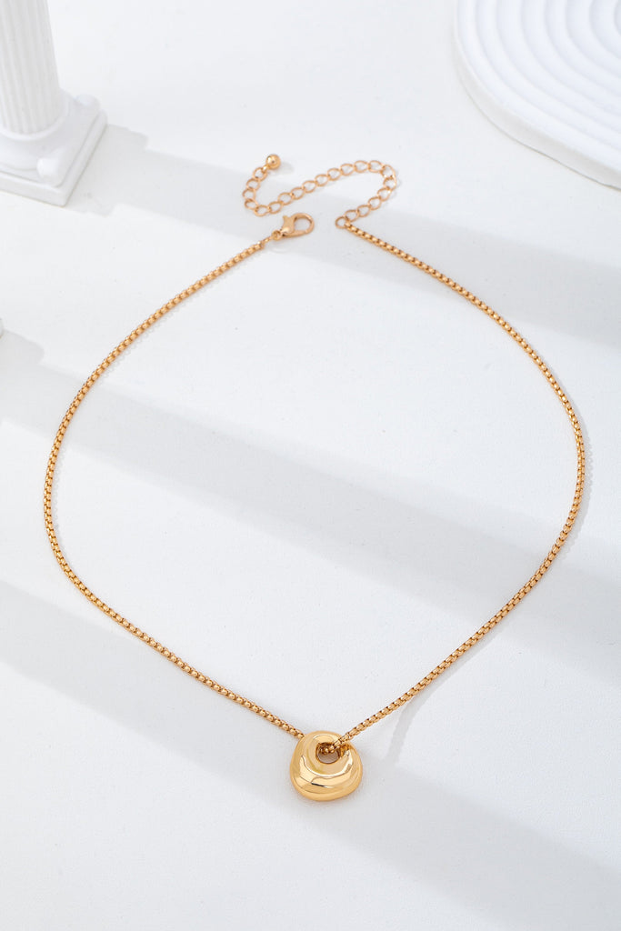 Sculptural Gold-Tone Pebble Necklace | 80N93057