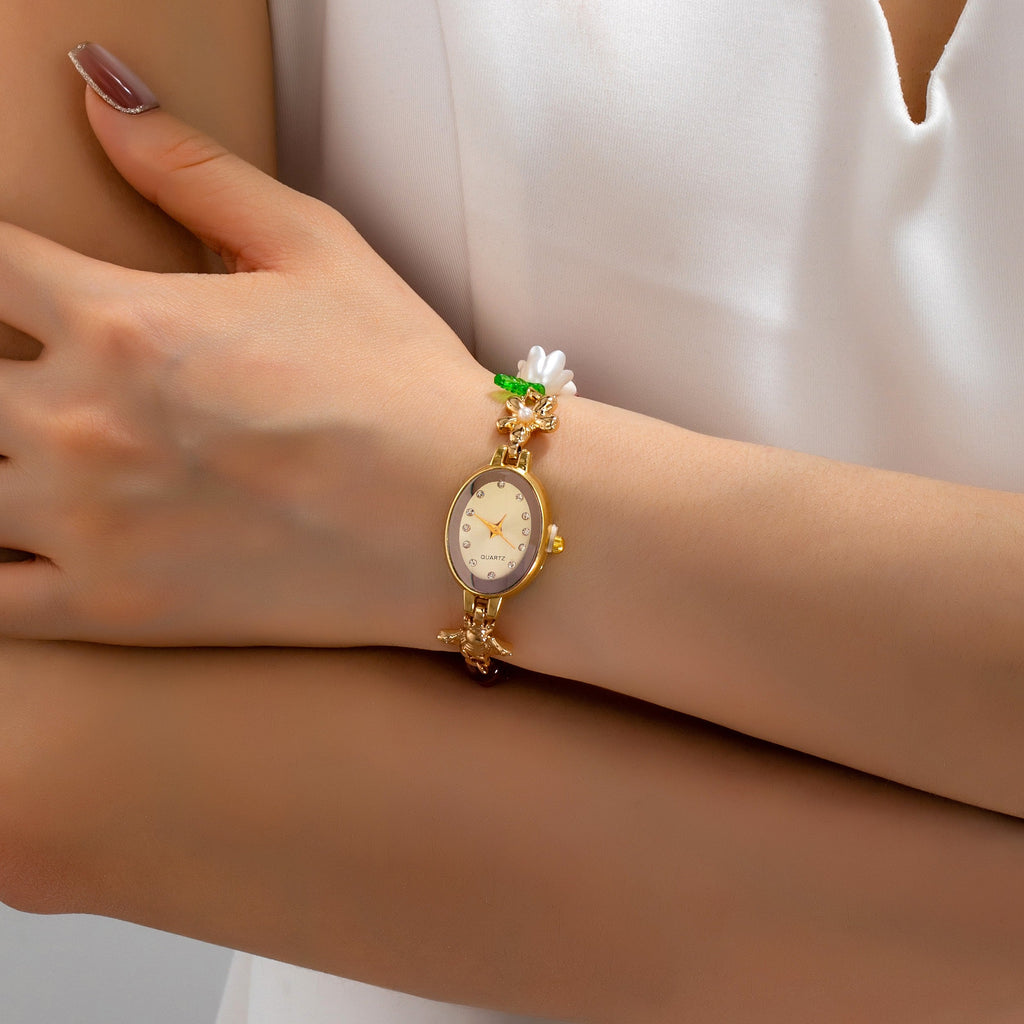 OVAL DIAL PORCELAIN CHARM BRACELET WATCH | 80W014