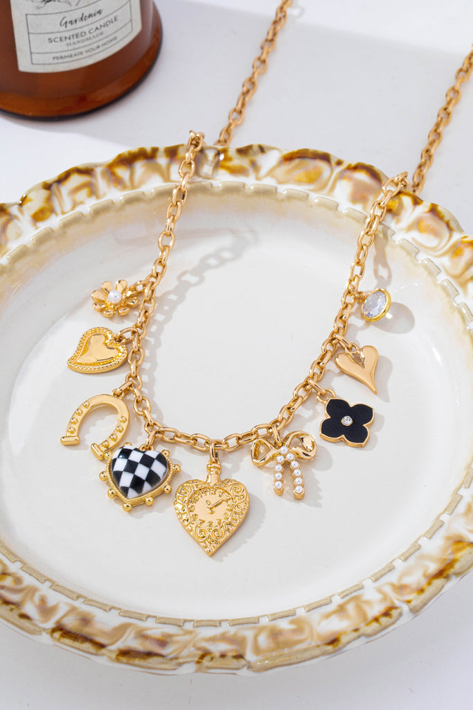 Checkered Heart Pearl Bow Multi-Charm Link Necklace | 80N93113