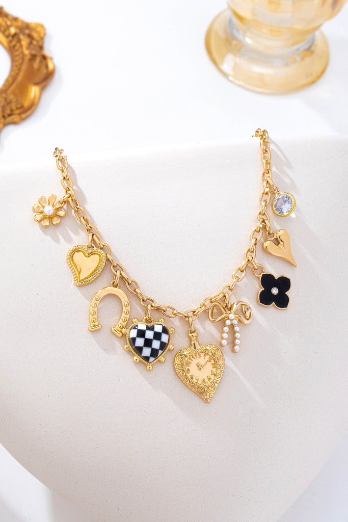 Checkered Heart Pearl Bow Multi-Charm Link Necklace | 80N93113
