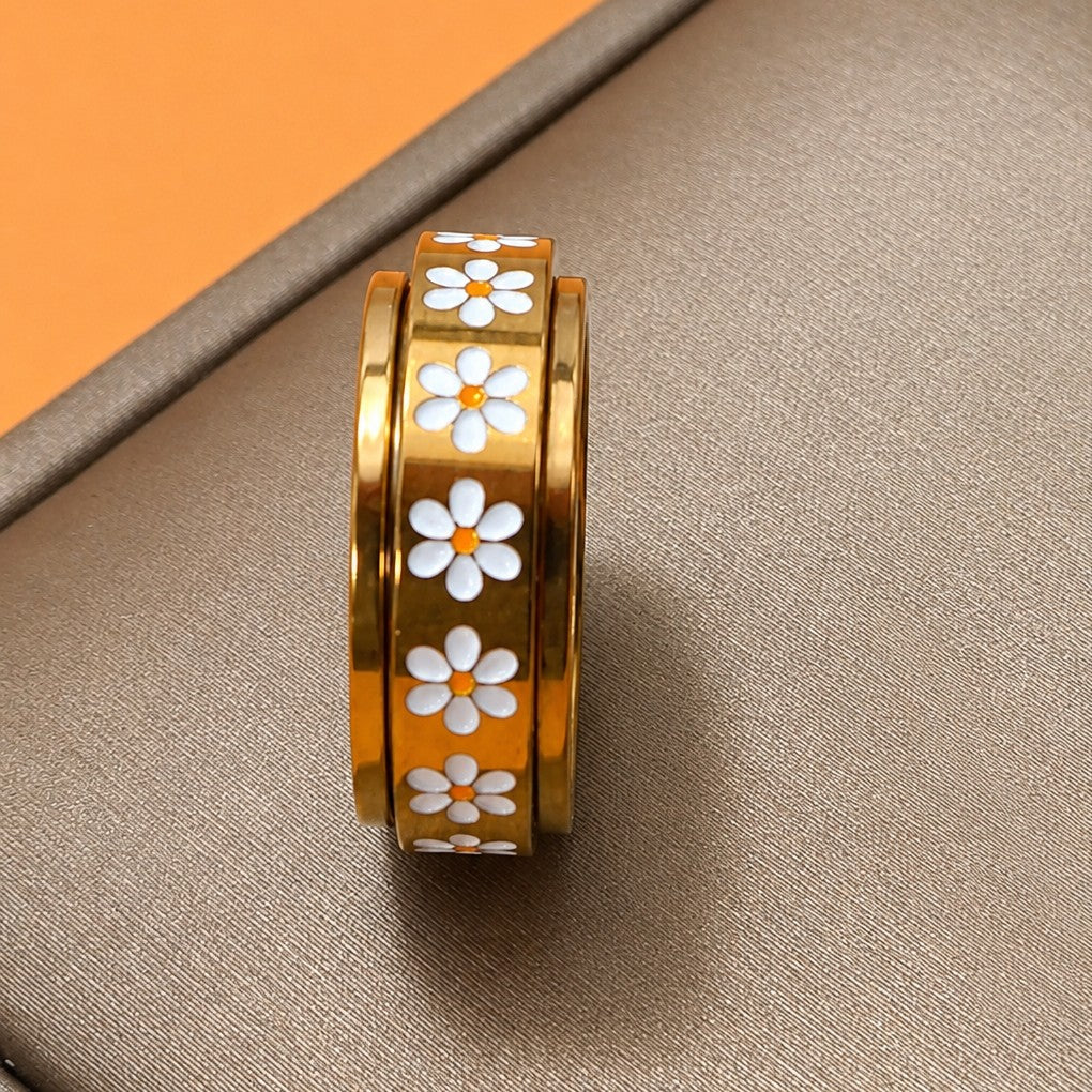 18K STAINLESS STEEL TARNISH FREE DAISY SPINNER RING | 40R155