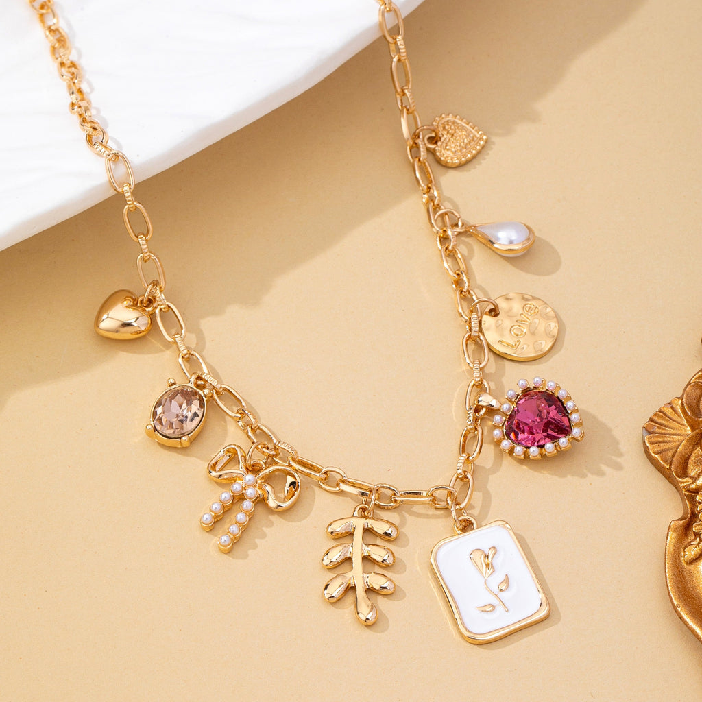 Romantic Pink Heart & Bow Multi-Charm Necklace | 80N93409