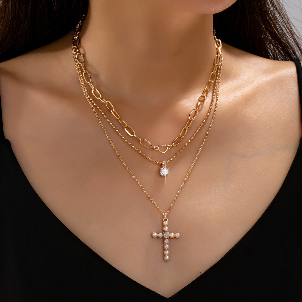 Multi-Layered Pearl Cross Rhinestone Necklace | 80N93577