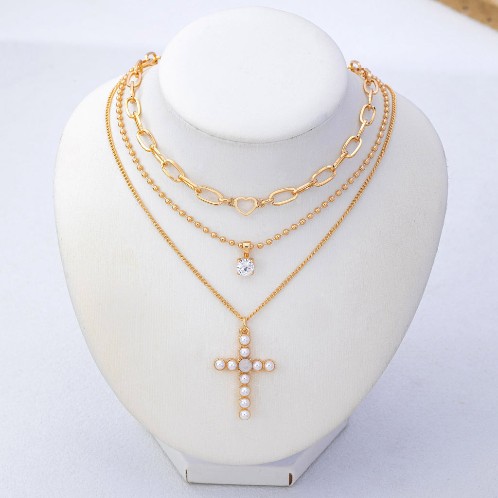 Multi-Layered Pearl Cross Rhinestone Necklace | 80N93577