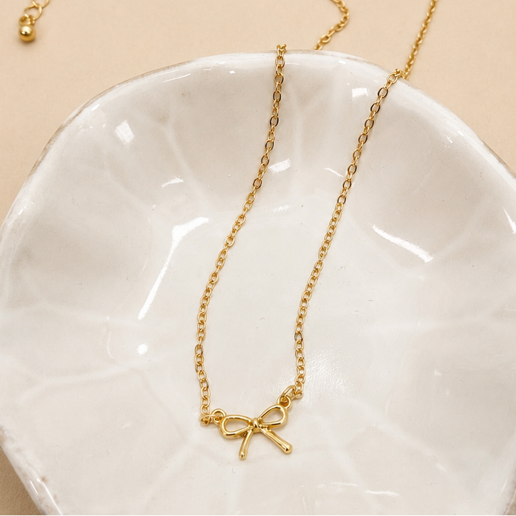 MINI GOLD BOW CHARM NECKLACE | 80N346