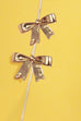 RADIANT GOLD MODERN BOW EARRINGS | 80E5491