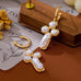 Elegant Pearl Cross Huggie Drop Earrings | 80E63380