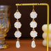 Carved Floral & Faux Pearl Linear Drop Earrings |  80E63366