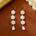 Carved Floral & Faux Pearl Linear Drop Earrings |  80E63366