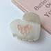 VALENTINE EMBEDDED BOW ON A HEART HAIR CLAW CLIPS | 40H875