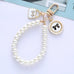 PEARL WRISTLET BOW HEART SEASHELL BAG KEYCHAINS | 40KC134