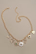 CHARM NECKLACE-HEART CROSS SUNBURST STONE | 80N91423