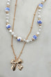 CERAMIC PORCELAIN PEARL BOW LAYER NECKLACE | 80N91555