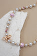 PINK CERAMIC PORCELAIN PEARL BOW NECKLACE | 80N91559