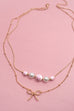 PINK CERAMIC PORCELAIN PEARL BOW LAYER NECKLACE | 80N91556