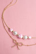 PINK CERAMIC PORCELAIN PEARL BOW LAYER NECKLACE | 80N91556