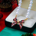 Holiday Tartan Plaid Fabric Bow Pearl Necklace | 80N93917