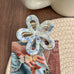JUMBO PVC CASTING ROUND FLORAL HAIR CLAW CLIPS | 40H986