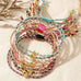 18K STAINLESS STEEL CORDED CROSS CHARM BRACELET | 40B5193