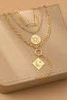 MULTI LAYER CELESTIAL MOON CHARM NECKLACE | 80N92456
