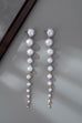 LONG STATEMENT LINEAR PEARL DROP EARRINGS | 80E61438