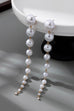 LONG STATEMENT LINEAR PEARL DROP EARRINGS | 80E61438