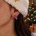 Holiday Red&White Peppermint Striped Bow Earrings | 80E63567