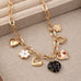 CHARM NECKLACE-HEARTS FLOWER  RHINESTONE | 80N92650