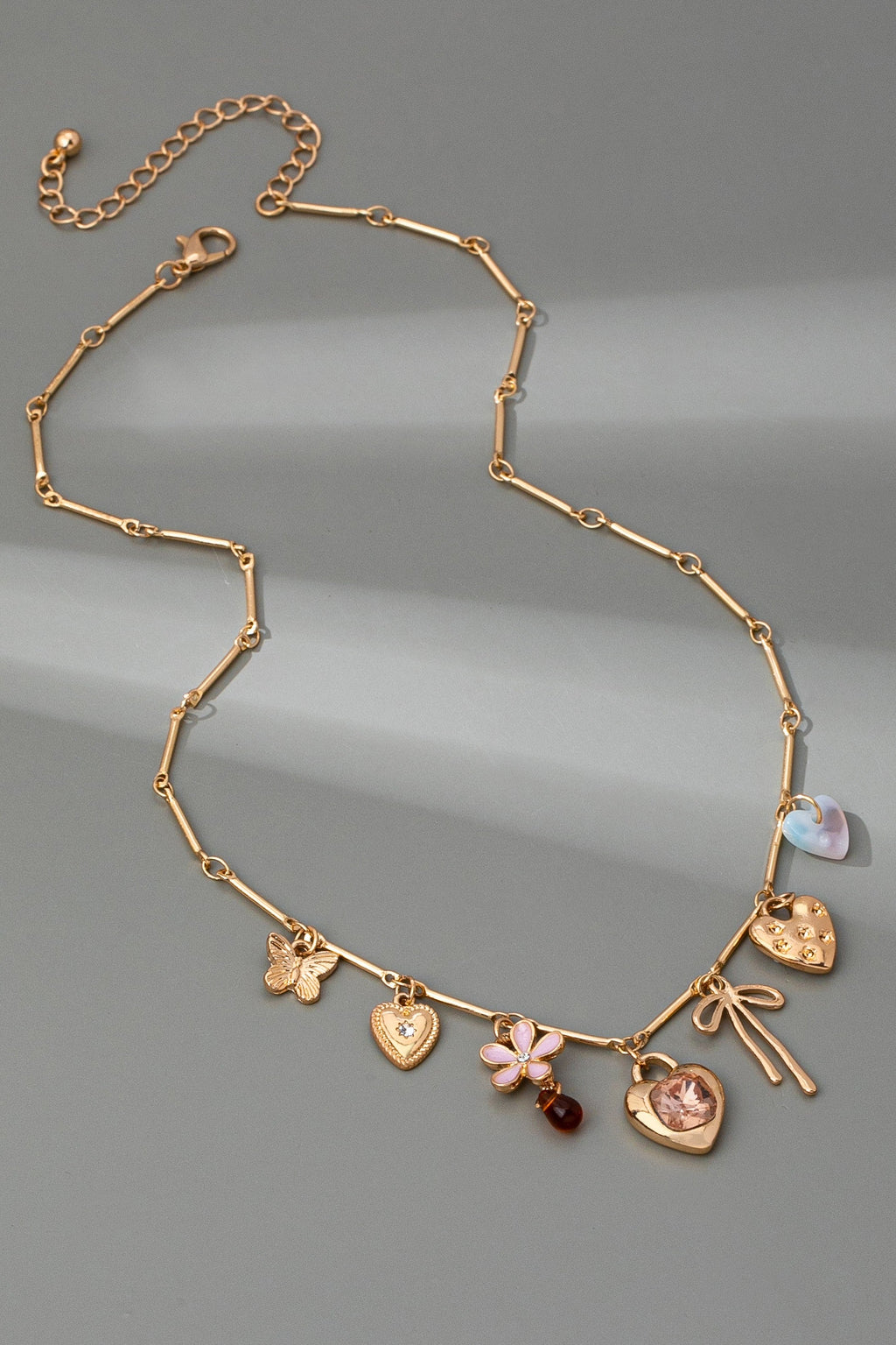 CHARM NECKLACE-HEARTS FLOWER BOW BUTTERFLY | 80N92639
