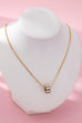 Gold-Tone Baguette Crystal Barrel Pendant Necklace | 80N92753