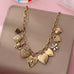 Vintage Gold-Tone Heart Charm Cluster Necklace | 80N92793